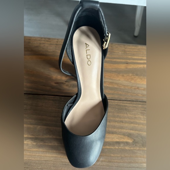 Black Aldo chunky heels with gold heart accent buckle. - Picture 2 of 4